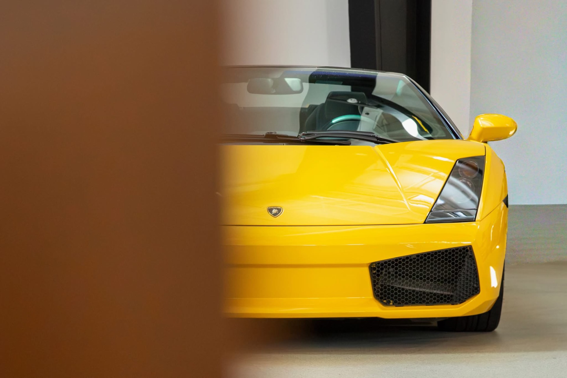 Yellow Lamborghini on display at Auburn Classic Cars